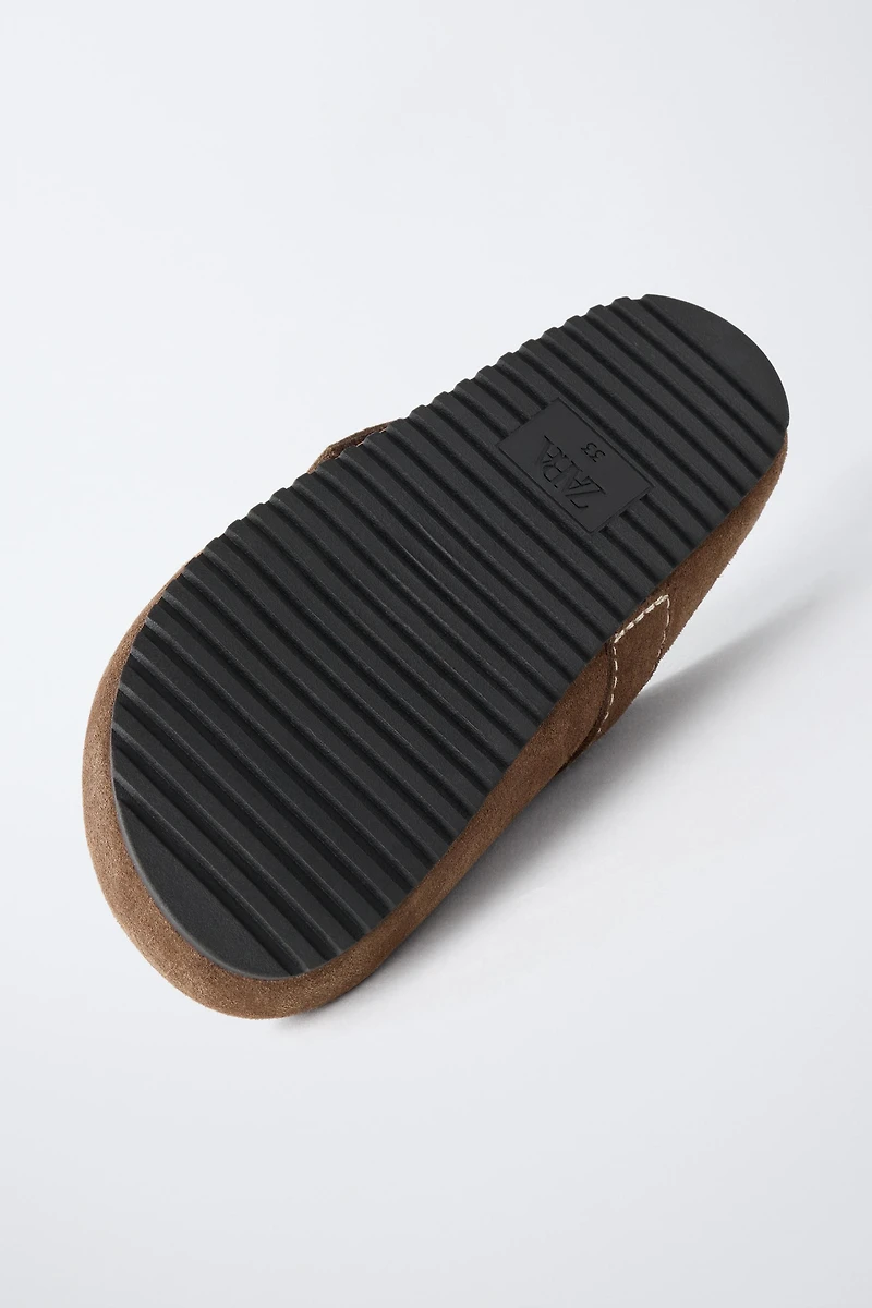 SABOTS EN CUIR AVEC SURPIQÛRES