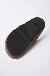 SABOTS EN CUIR AVEC SURPIQÛRES