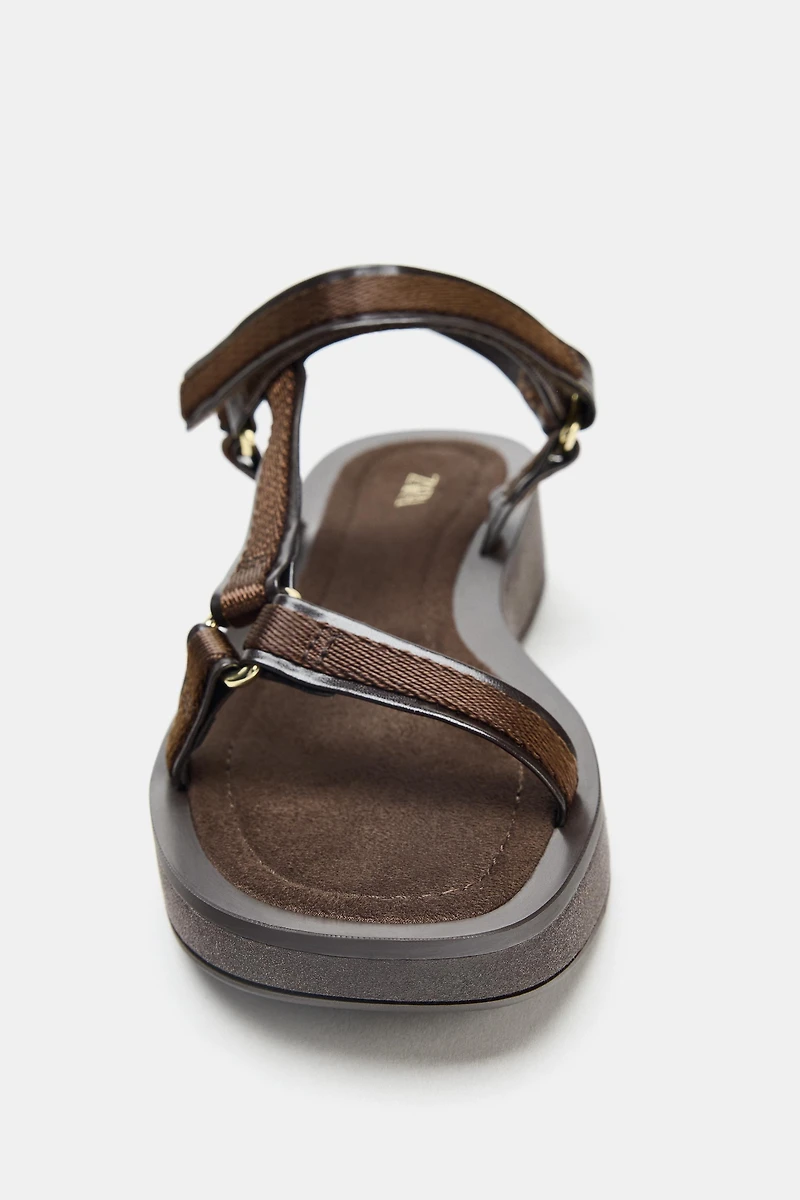 STRAPPY ADHESIVE SANDALS