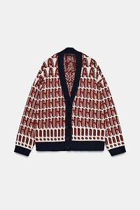 GILET OVERSIZE EN MAILLE HOME ALONE ™