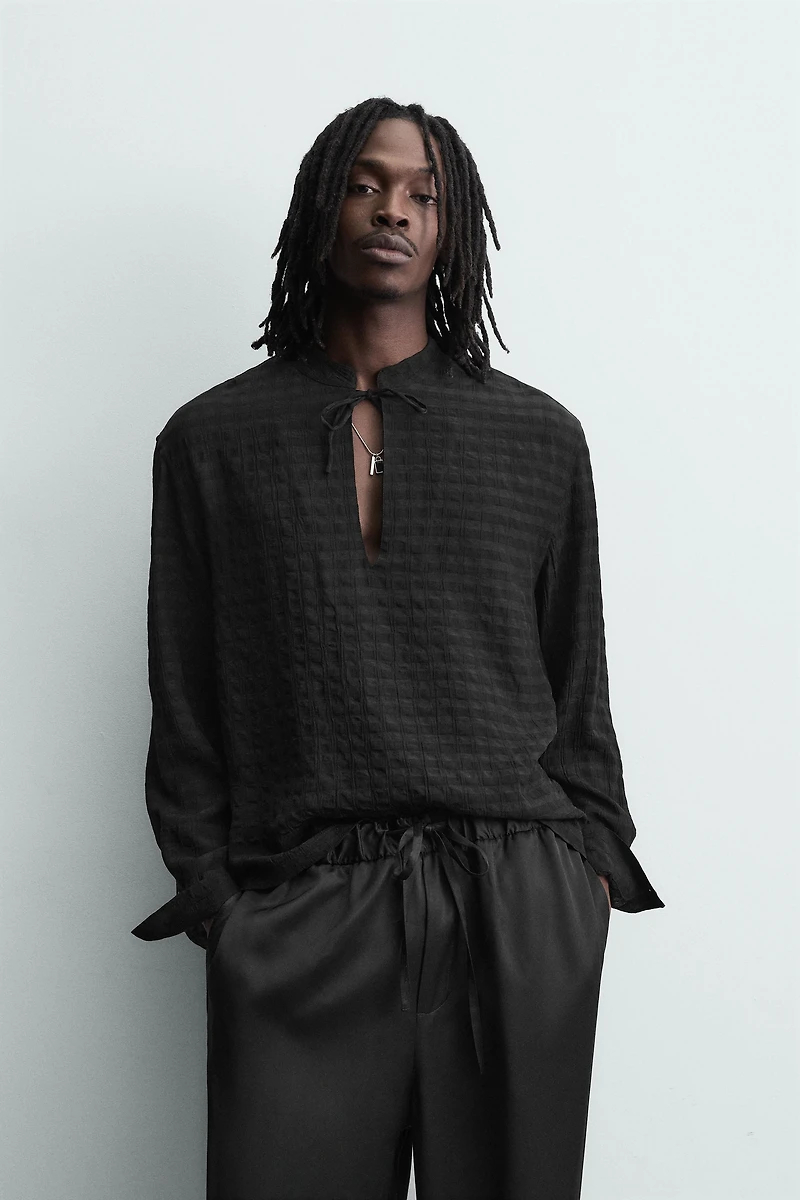 CHEMISE POLO FLUIDE STRUCTURÉE