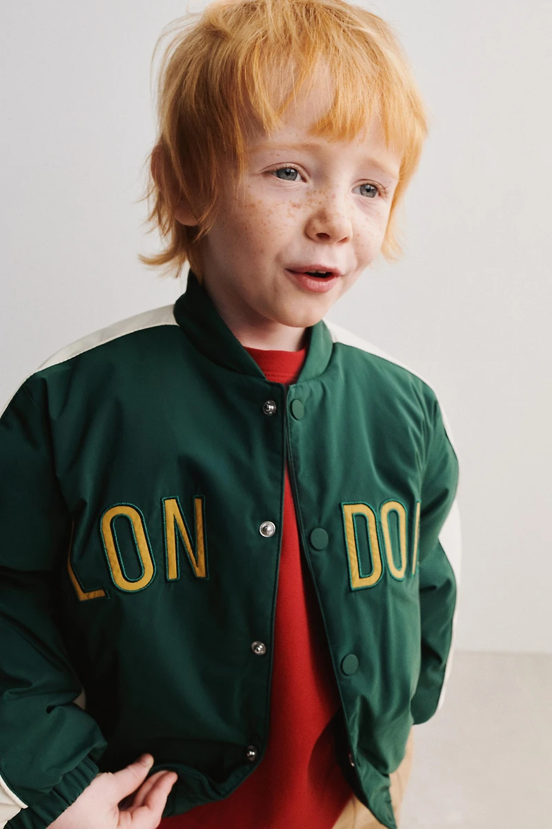 WATER REPELLENT BOMBER JACKET WITH DETACHABLE FLEECE HOODIE