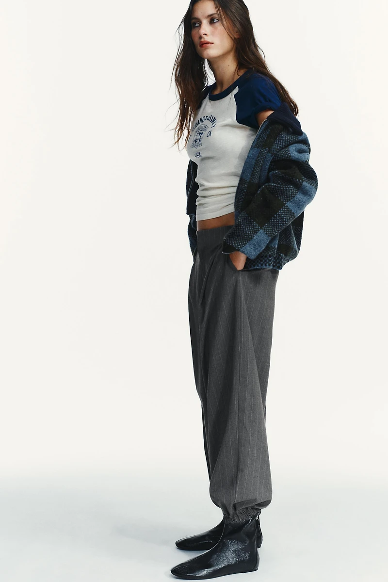 PINSTRIPE PLEATED JOGGER PANTS