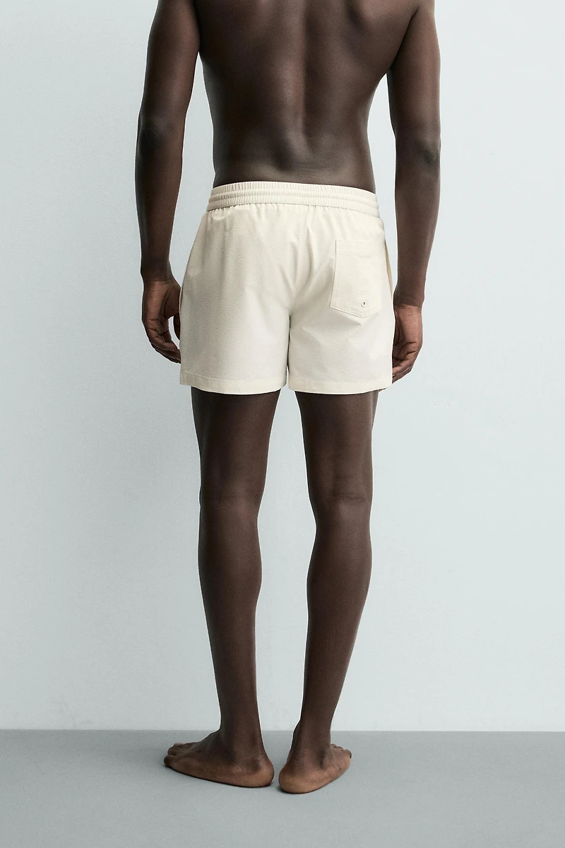 SEERSUCKER SWIM TRUNKS
