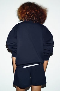 OVERSIZED ZIP-UP SWEATSHIRT