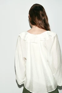 BLOUSE À VOLANTS ET PLIS