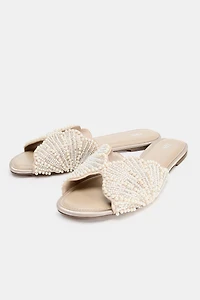 FLAT SANDALS WITH SHINY APPLIQUES