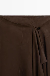 Suede leather midi skirt with ruffle detail