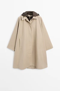 Cape trench coat with hood