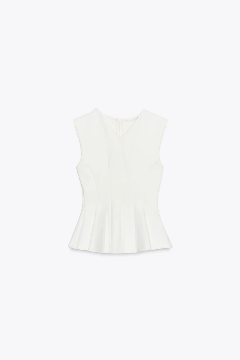 SLEEVELESS INTERLOCK PEPLUM TOP
