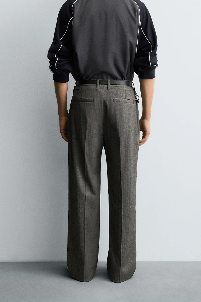 HERRINGBONE SUIT FLARE FIT PANTS