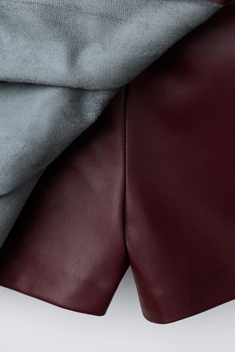 FAUX LEATHER PLEATED SKORT