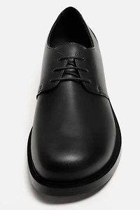 CHAUSSURES HABILLÉES