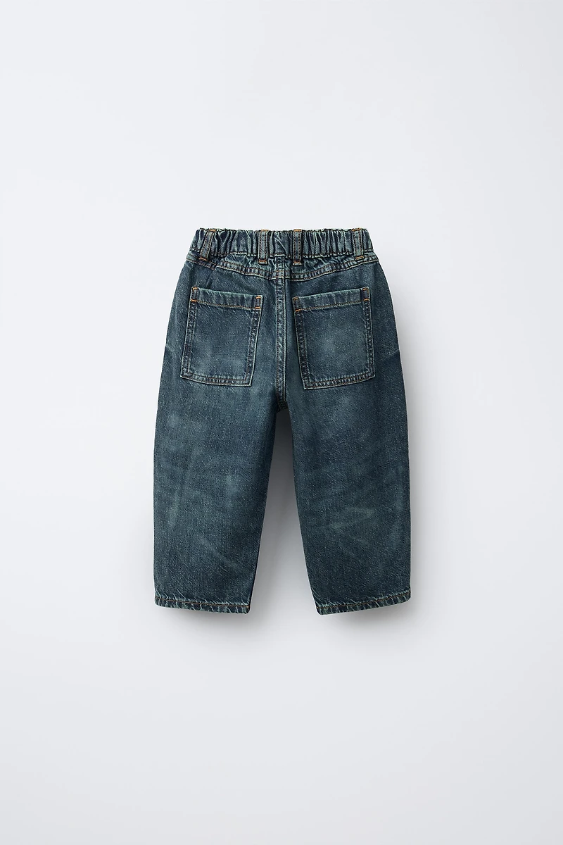DISTRESSED BALLOON JEANS