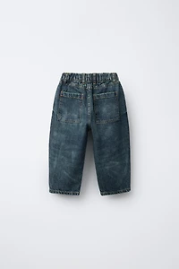 DISTRESSED BALLOON JEANS