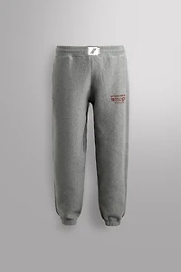 JOGGING PANTS WITH PRINTED TEXT