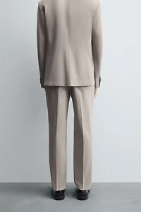 TEXTURED SUIT PANTS