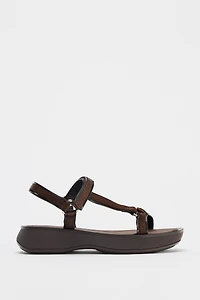 STRAPPY ADHESIVE SANDALS