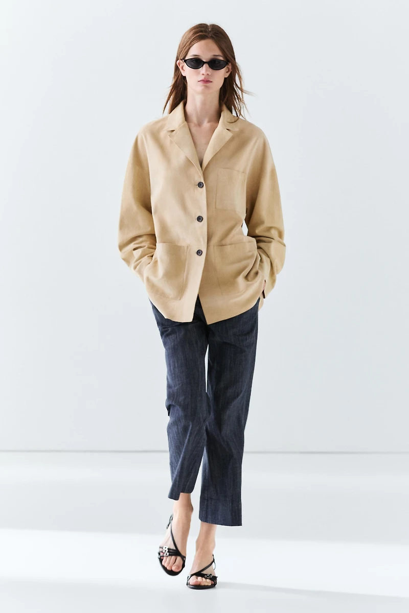 Blazer à poches en cuir velours