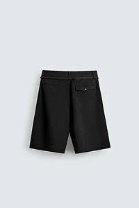 BELTED PLEATED RELAXED FIT SHORTS