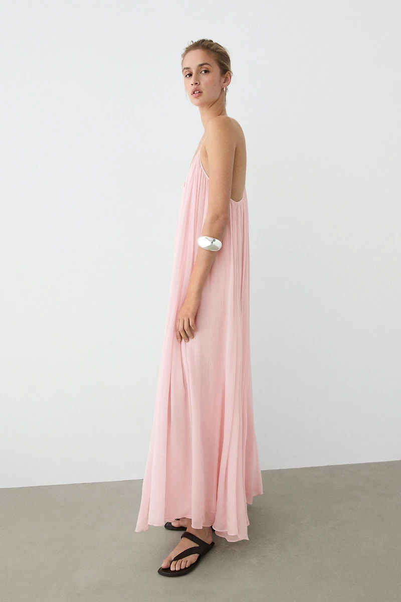 Flowing pleated spaghetti strap dress