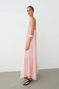 Flowing pleated spaghetti strap dress