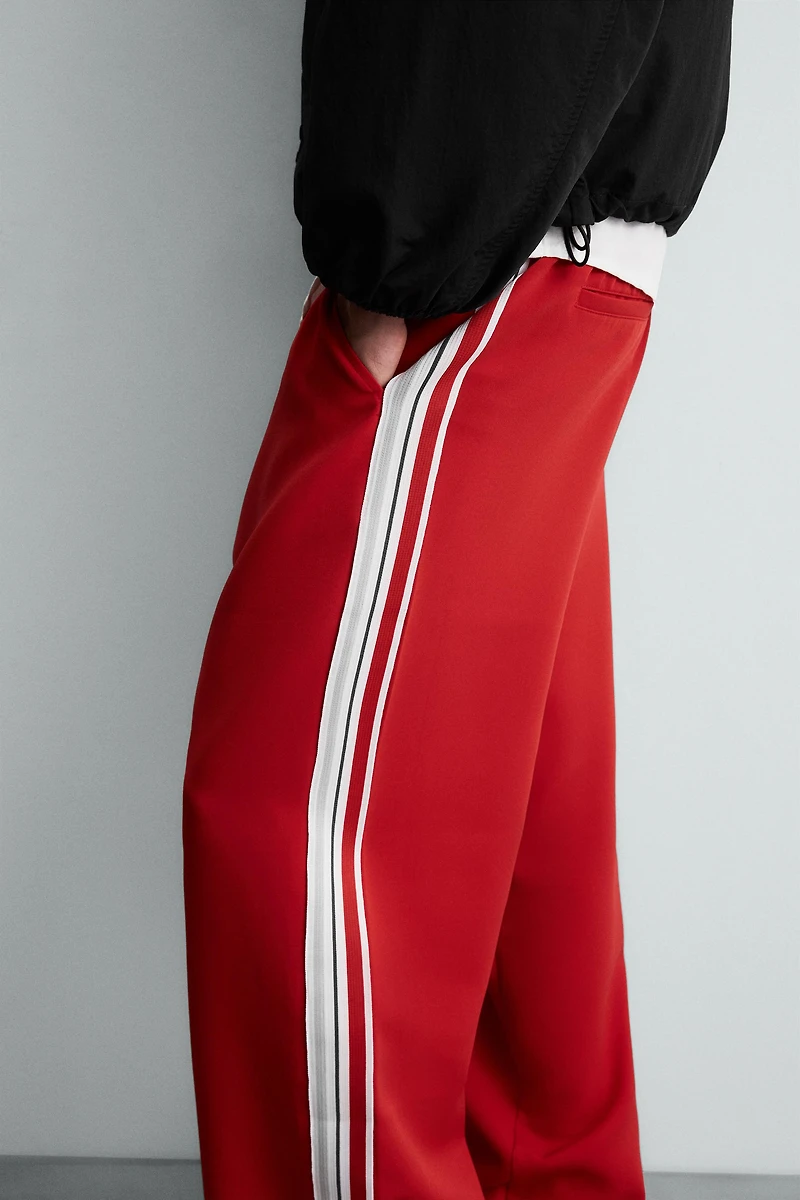 WIDE FIT JOGGER PANTS WITH SIDE STRIPES