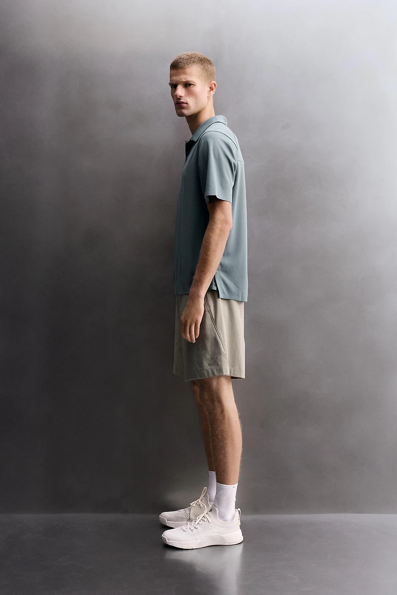 TECHNICAL PIQUÉ TRAINING POLO