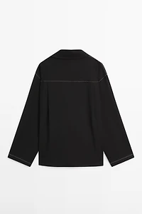 Flowing wool blend overshirt with pocket detail