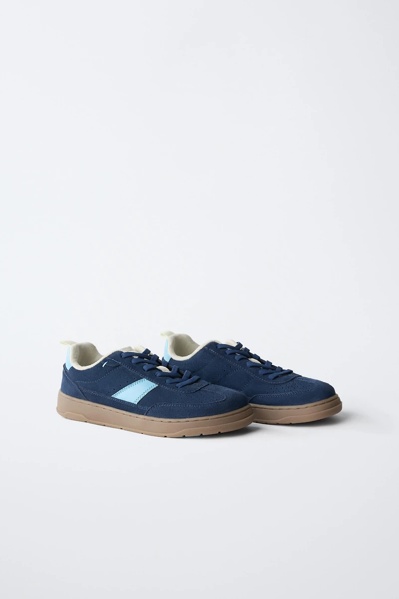 TENNIS EN CUIR PIEDS NUS