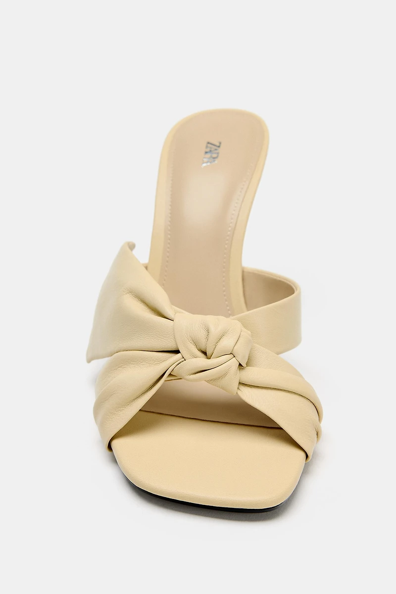 LEATHER BOW HEELED SANDALS