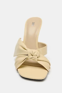 LEATHER BOW HEELED SANDALS