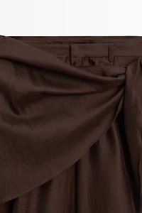 Long flowing Bermuda shorts with scarf detail
