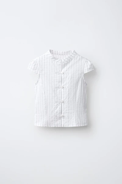 CHEMISE À RAYURES ET DÉCOR BRANDEBOURGS