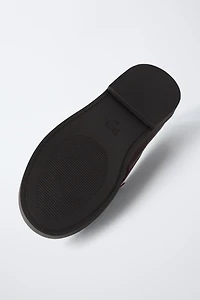 MOCASSINS À POMPONS EN CUIR LIMITED EDITION