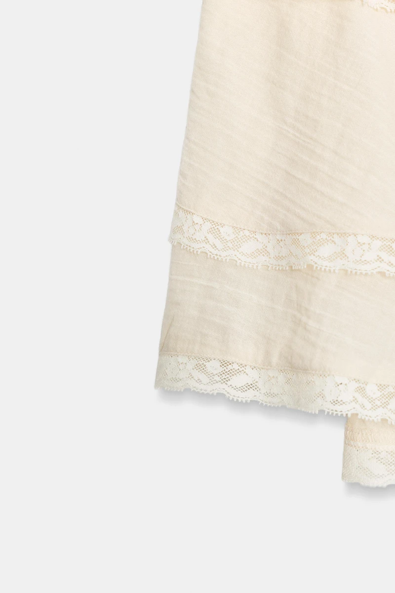 MINI JUPE VOLANTS DENTELLE