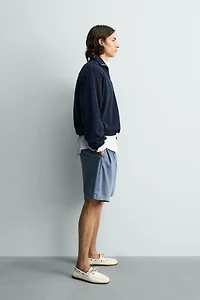 PIQUÉ QUARTER-ZIP SWEATSHIRT