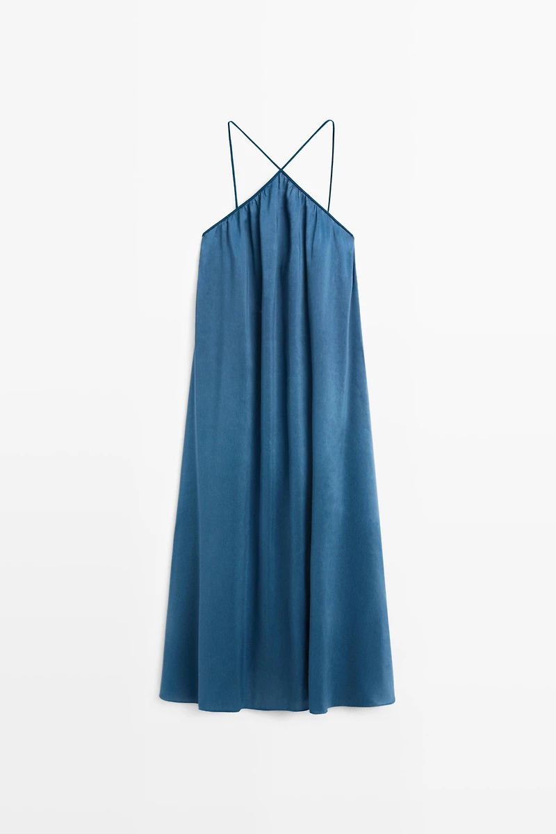Long flowing dress with criss-cross straps