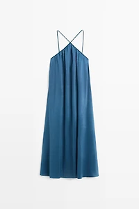 Long flowing dress with criss-cross straps