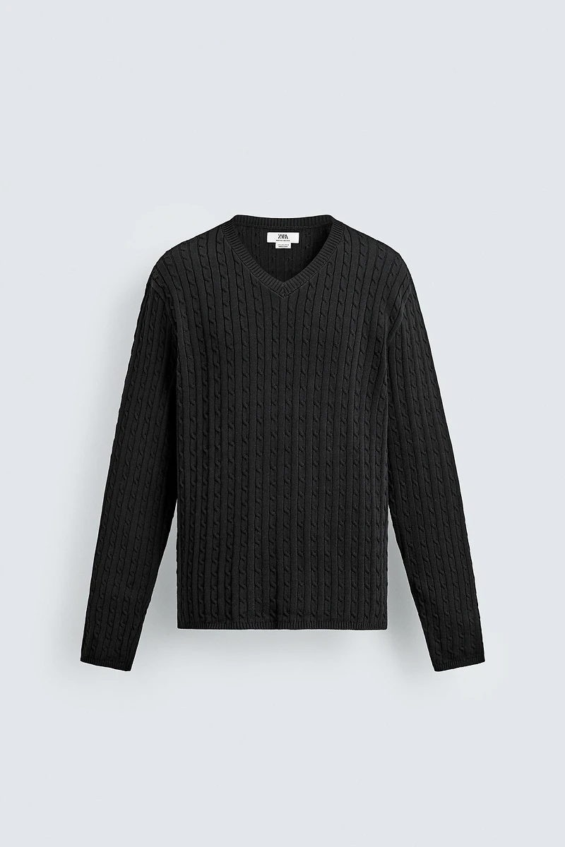 PULL STRUCTURÉ À TORSADES