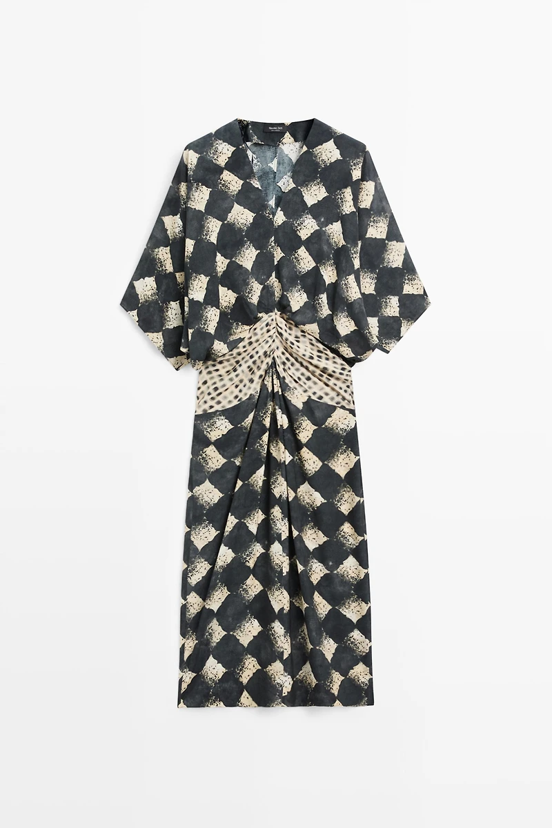 Flowing dress with sash belt detail
