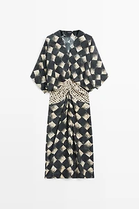 Flowing dress with sash belt detail
