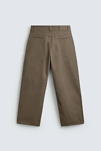 PLEATED BAGGY FIT CHINO PANTS