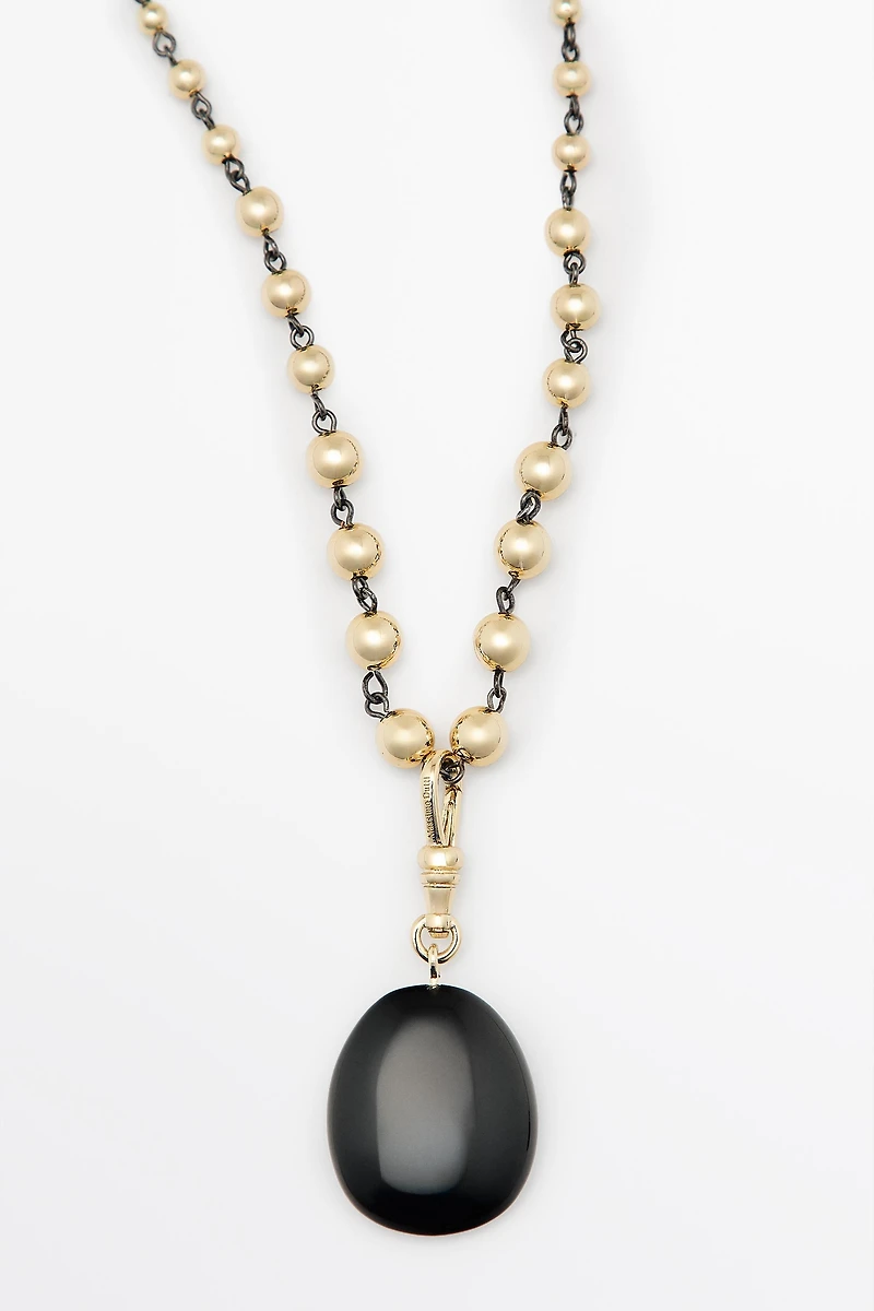 Beaded chain necklace with onyx piece