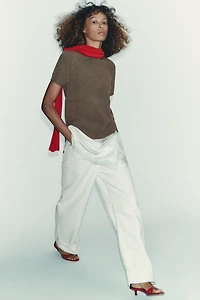 TOP EN MAILLE MANCHES COURTES AU TOUCHER DOUX