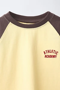 EMBROIDERED TEXT RAGLAN SLEEVE T-SHIRT