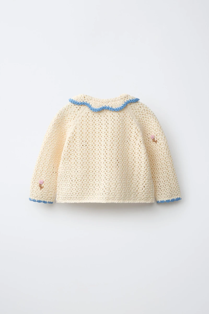 VESTE BRODÉE POMPONS