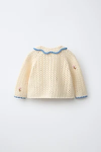 VESTE BRODÉE POMPONS