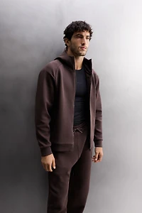 SWEAT TECHNIQUE À CAPUCHE ZIPPÉ