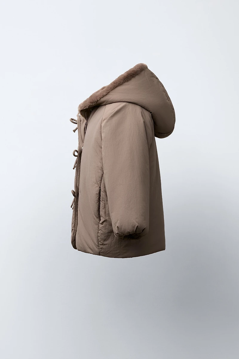 WATER REPELLENT PUFFER COAT WITH BOWS